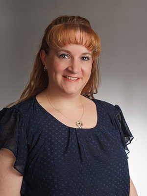 Staff headshot of kim estes